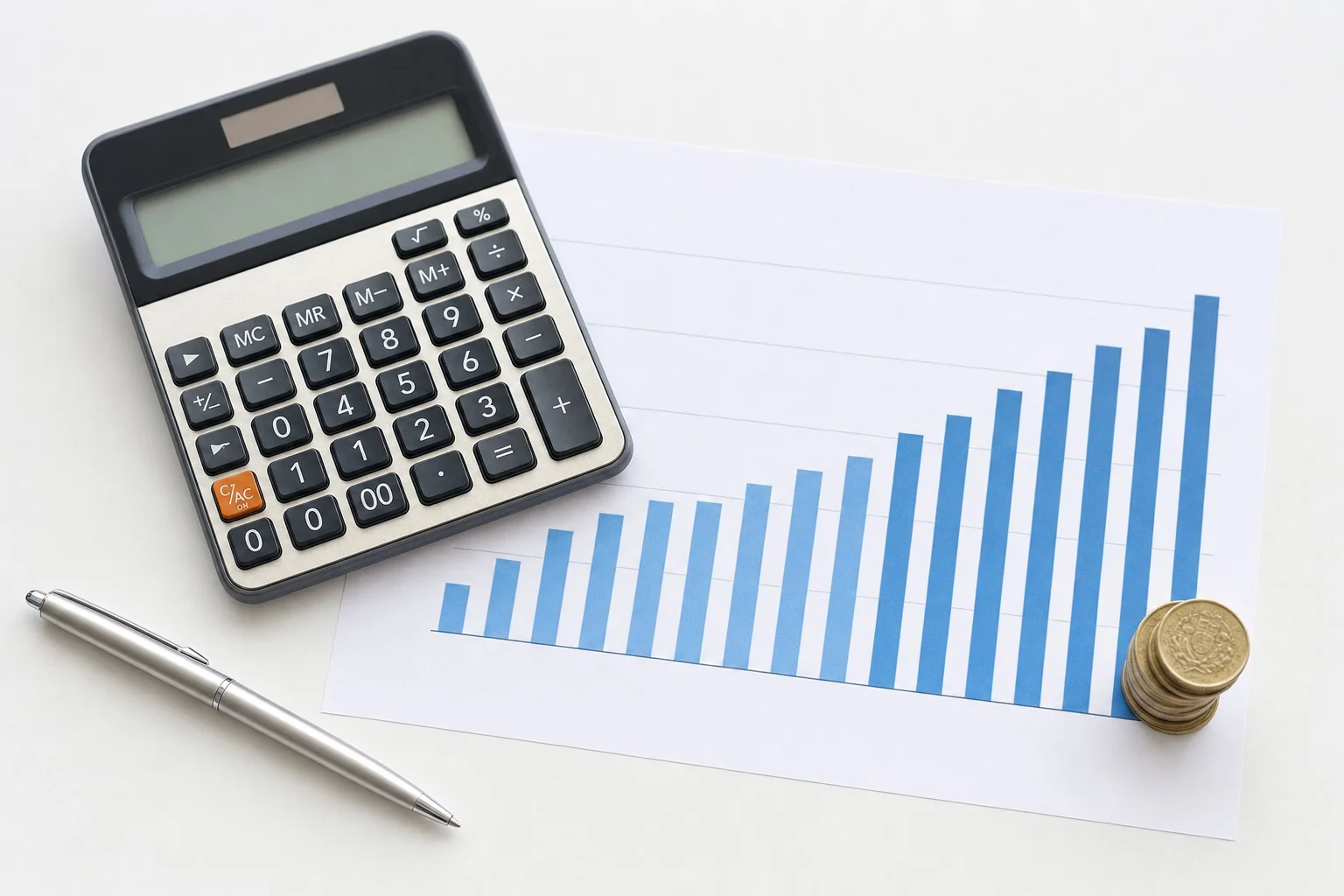 Flat lay showing a revenue recovery chart, calculator, and coins representing recovered subscription payments.